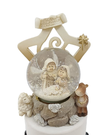 Natività in sfera di vetro con neve e stella