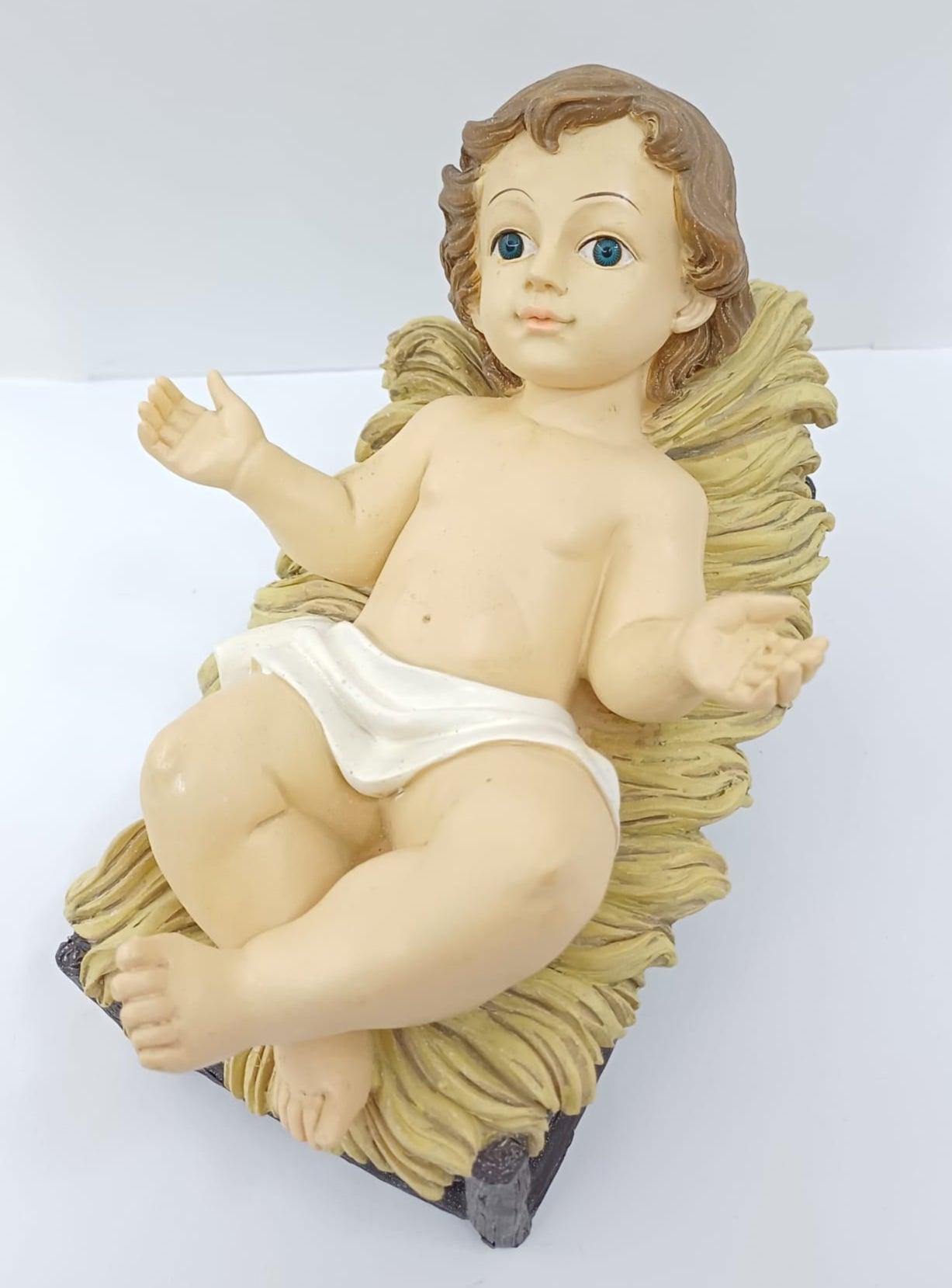 Gesù Bambino in culla di resina
