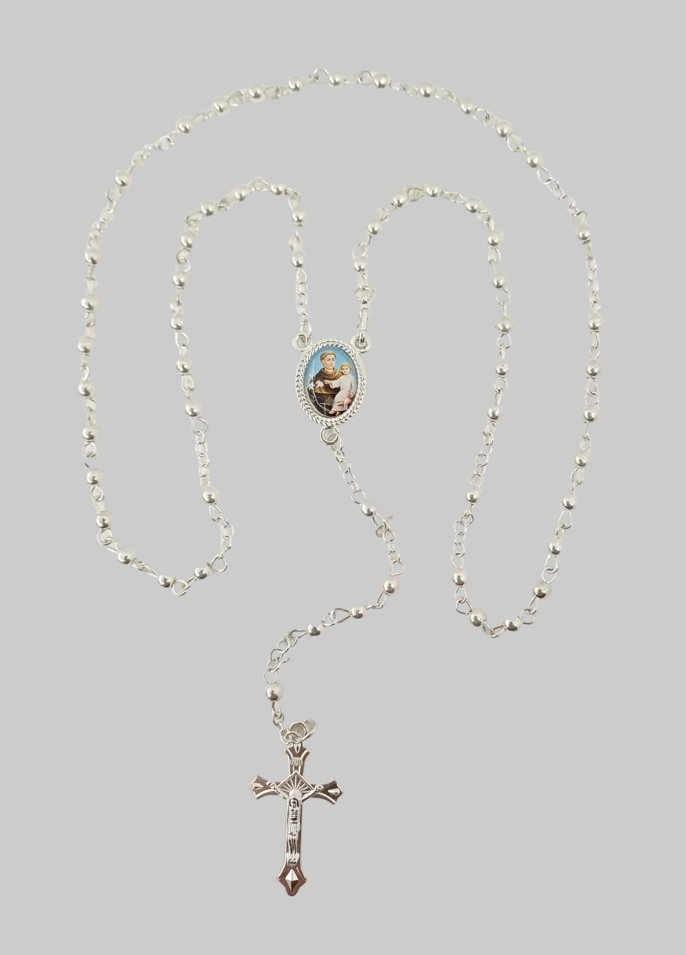 Rosario con grani color argento